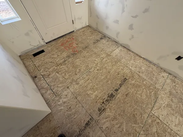 With the finish removed, the subfloor can be reviewed before installation.