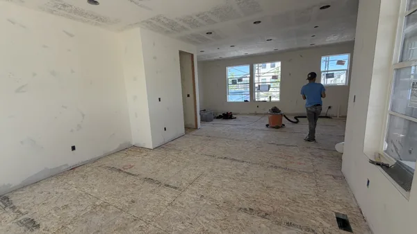 A connected living area before its new flooring goes down.