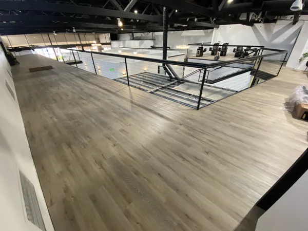A view of the LVP installation work, finished areas or flooring details at The Beauty Stop.