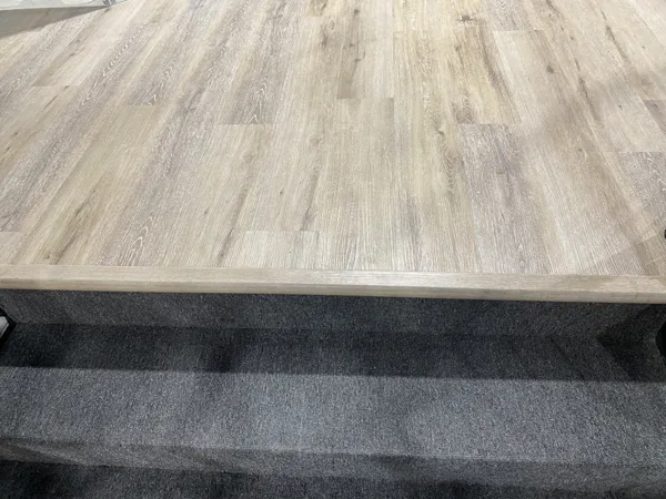 A view of the LVP installation work, finished areas or flooring details at The Beauty Stop.