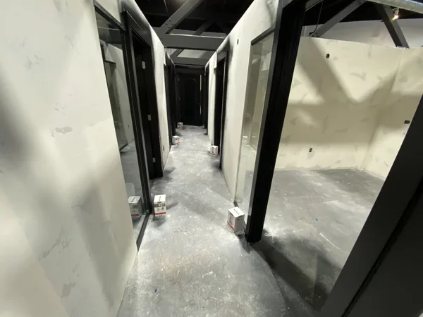 A view of the LVP installation work, finished areas or flooring details at The Beauty Stop.