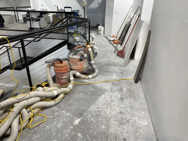 A view of the LVP installation work, finished areas or flooring details at The Beauty Stop.