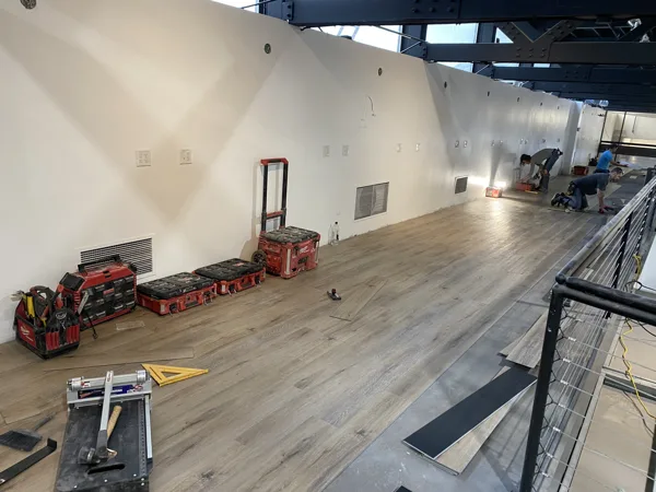 A view of the LVP installation work, finished areas or flooring details at The Beauty Stop.