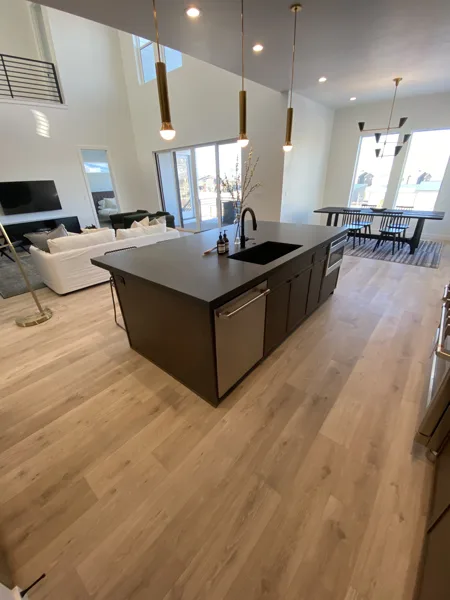 Laminate alongside the fireplace and living-room seating.