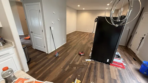 Plank flooring through the kitchen and adjoining living space.