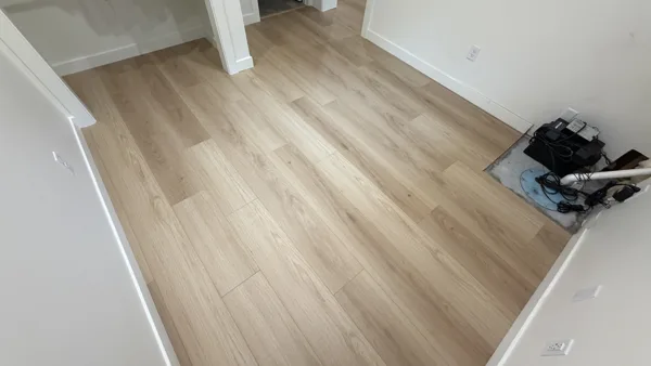 Replacement plank flooring in the basement rooms and hallway.