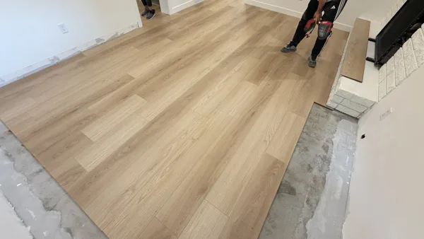 Replacement plank flooring in the basement rooms and hallway.