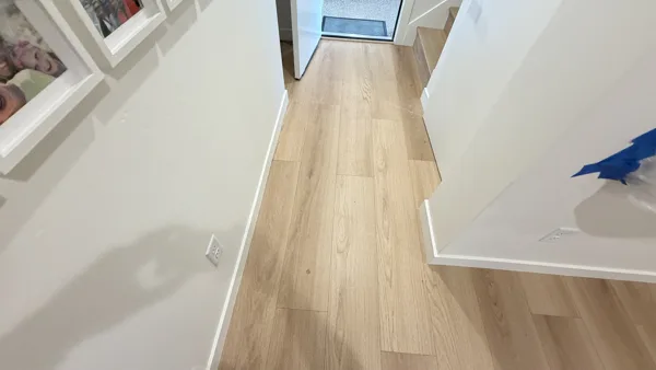 Replacement plank flooring in the basement rooms and hallway.