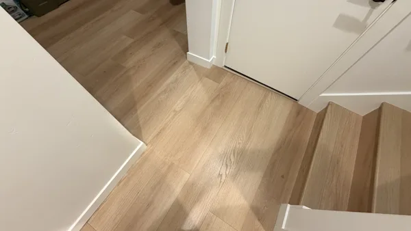 Replacement plank flooring in the basement rooms and hallway.