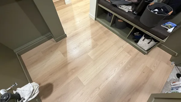 Replacement plank flooring in the basement rooms and hallway.